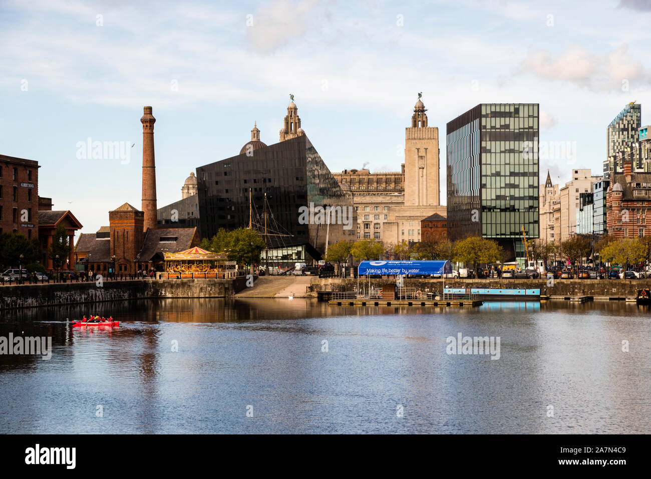Salthouse Dock lies at dusk in Liverpool, England, seen here from Gower Street. Opened in 1753, the dock historically handled the transhipment of salt from Cheshire as well as agricultural produce from Ireland and the Mediterranean. Stock Photo