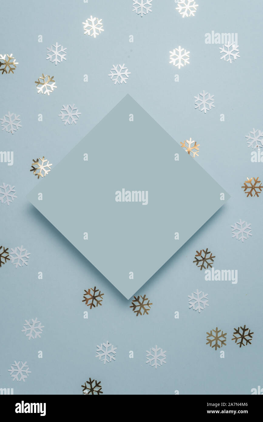 Creative New Year or Christmas greetings letter mockup flat lay top view Xmas holiday celebration, with golden glitter star on light green mint backgr Stock Photo