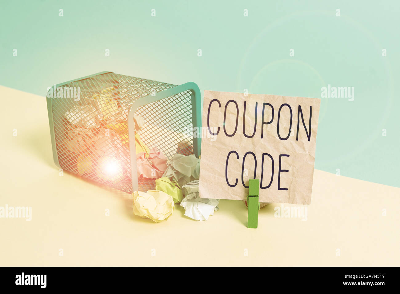 Conceptual hand writing showing Coupon Code. Concept meaning ticket or document that can be redeemed for a financial discount Trash bin crumpled paper Stock Photo