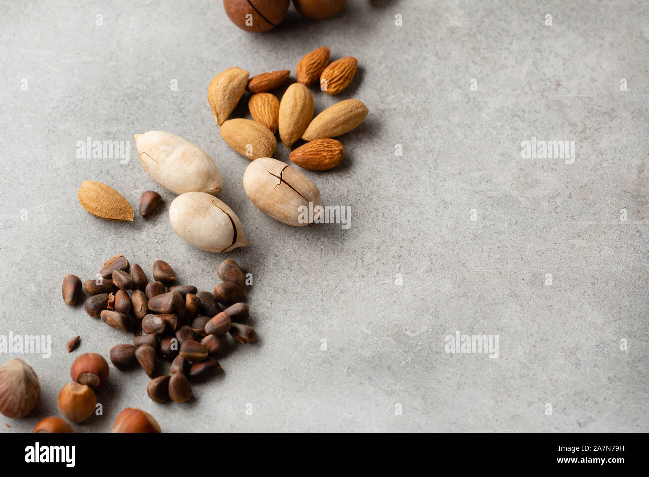 Organic nuts mix on gray background Stock Photo