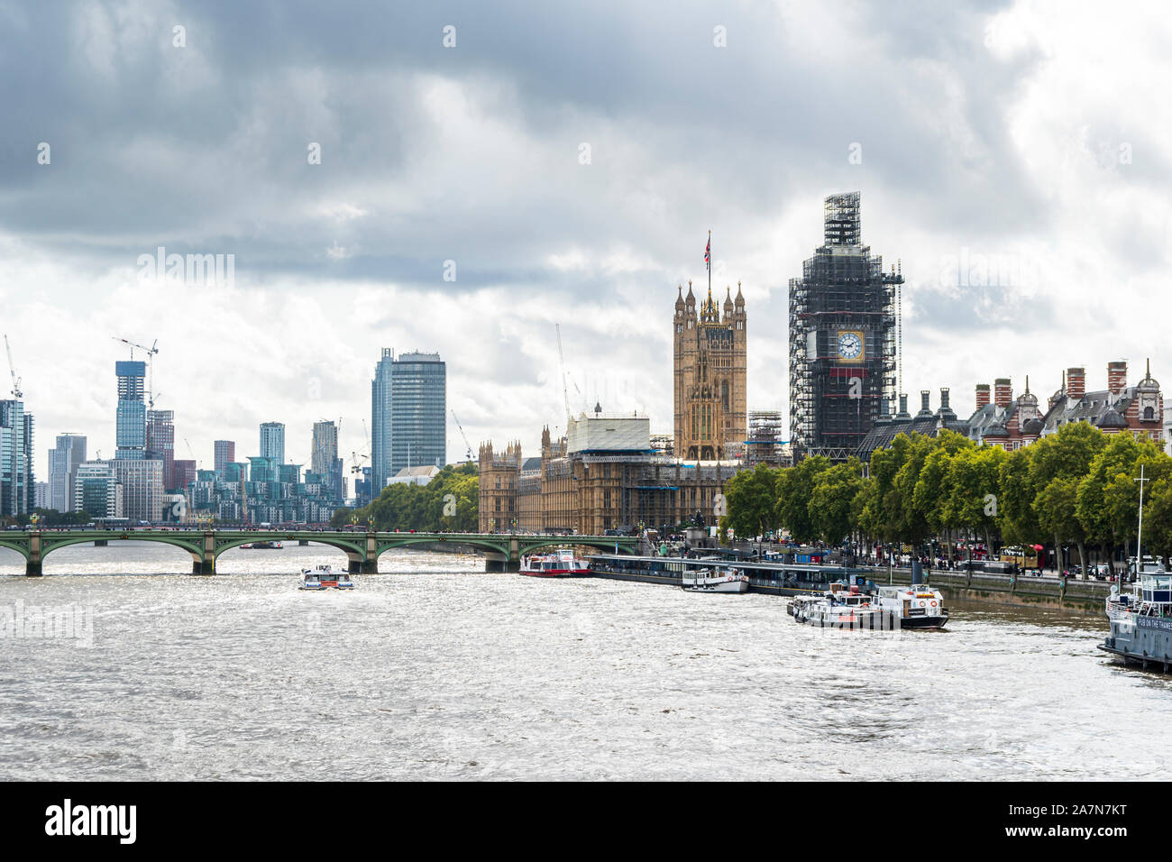 London's Houses of Parliament and the River Thames Stock Photo