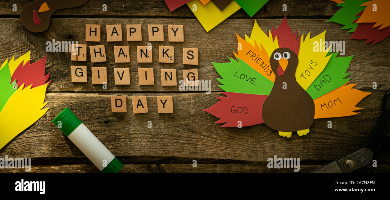 Thanksgiving paper craft - thanksful turkey on wood background Stock ...