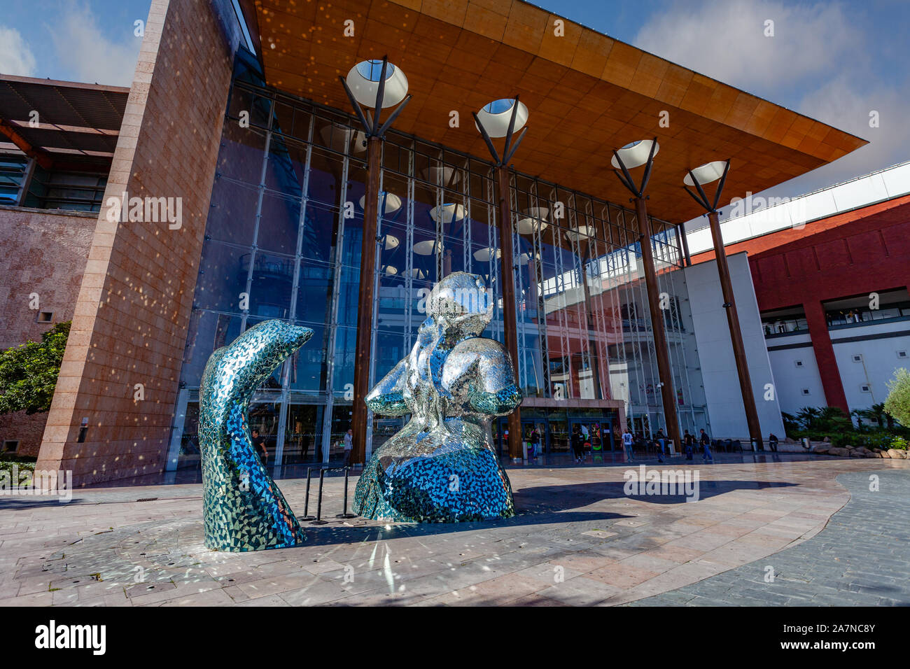 Almada, Portugal. Main entrance of the Almada Forum shopping center or mall  with the broken glass mermaid sculpture. One of the largest shopping malls  Stock Photo - Alamy