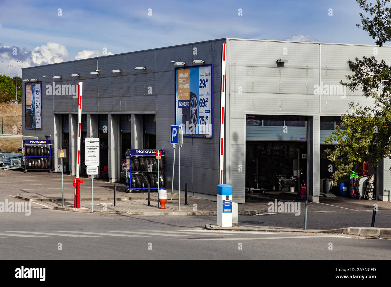 Coina, Portugal. Norauto car or auto service station and parts shop. Auto repair shop in Barreiro Planet Retail Park. Norauto is a French company. Stock Photo