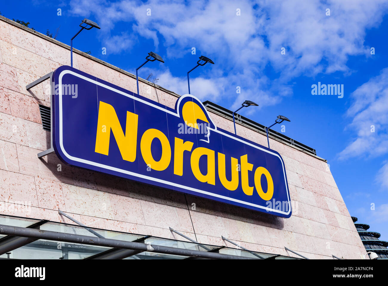 Almada, Portugal. Signboard of Norauto car or auto parts shop and service station or auto repair shop in Almada Forum shopping mall or center. Norauto Stock Photo