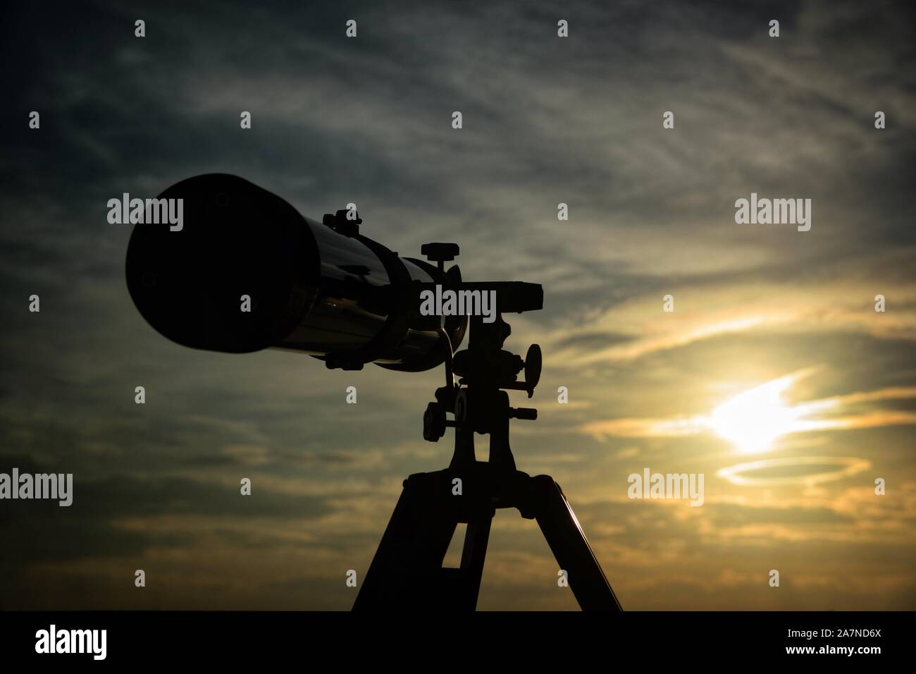 Telescope pointing to the night sky. Astronomy observation tool and