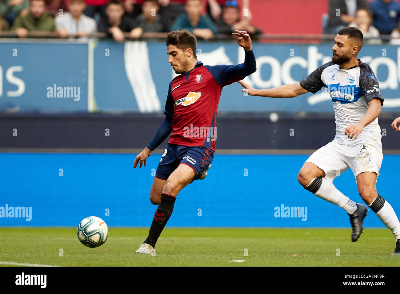 Nacho Vidal (defender; CA Osasuna) and Aleix Vidal (midfield; Deportivo Alavés) are seen in action during the Spanish football of La Liga Santander, match between CA Osasuna and Deportivo Alavés at the Sadar stadium, in Pamplona.(Final score; CA Osasuna 4:2 Deportivo Alavés) Stock Photo