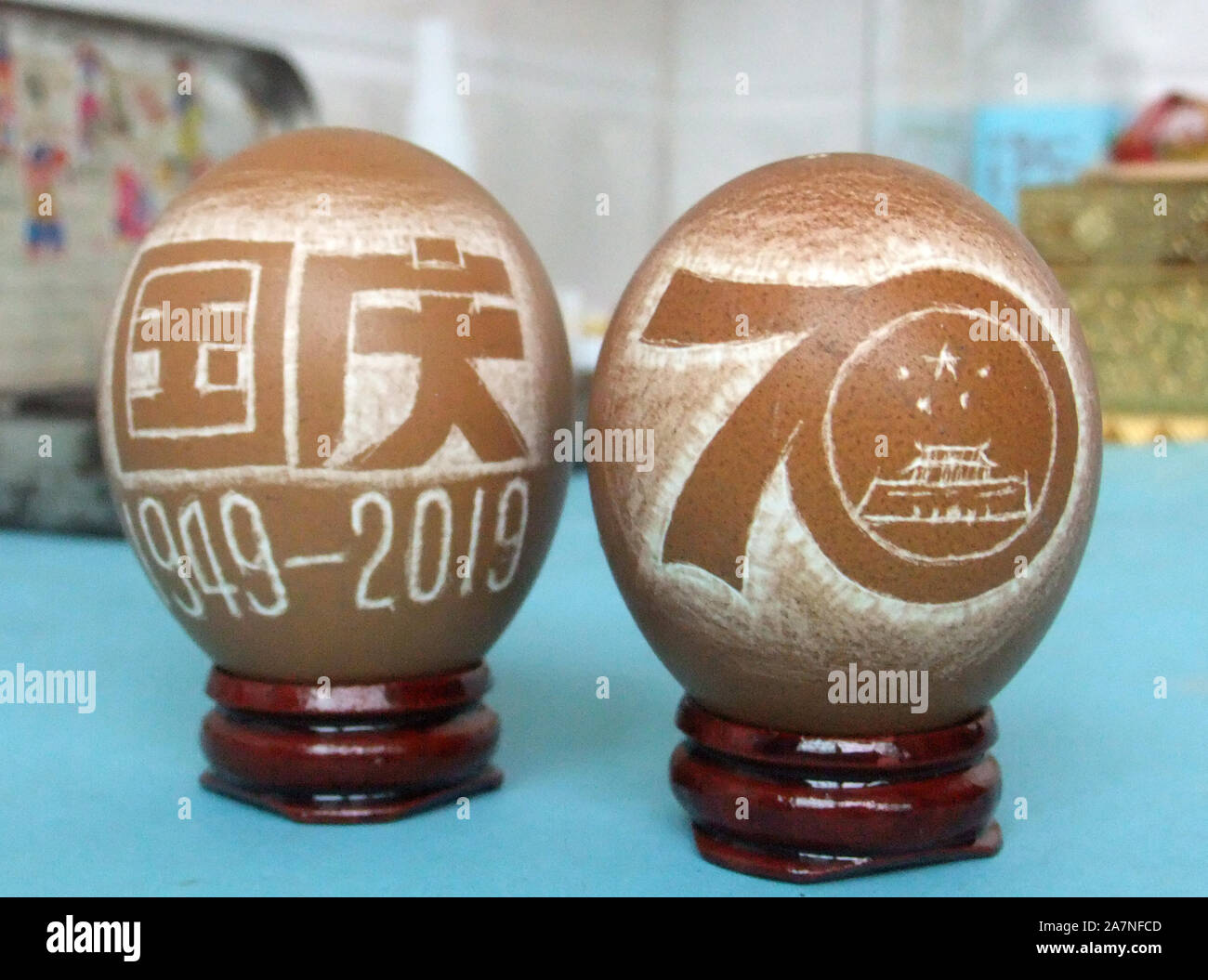 Photo of painted egg shells in Kaifeng city, central China's Henan province, 29 August 2019. A 70-year-old couplle, Mr. and Mrs. Zhang use flowers, ve Stock Photo