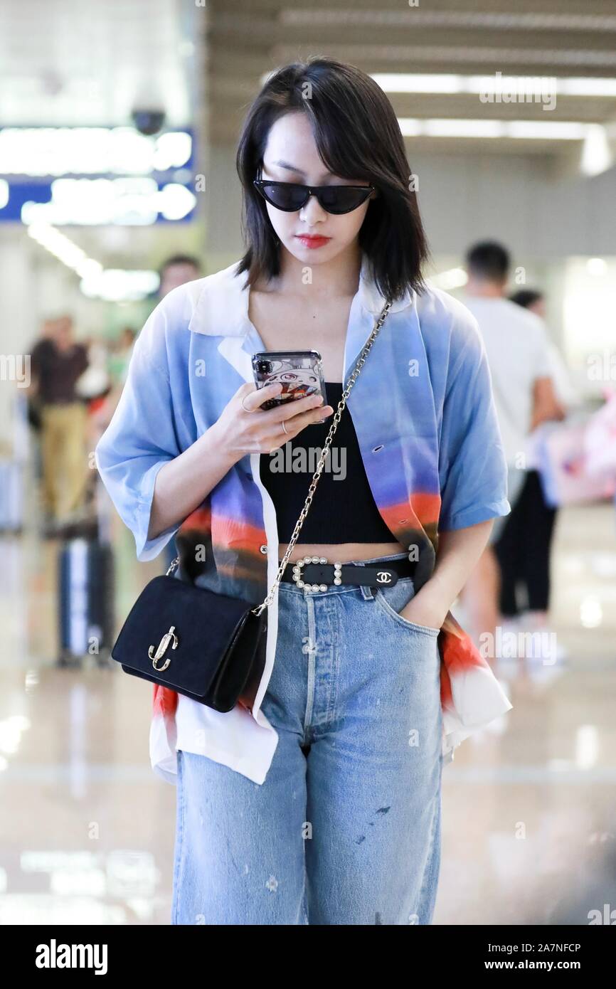 Chinese singer and actress Victoria Song or Song Qian arrives at the Beijing Capital International Airport after landing in Beijing, China, 17 August Stock Photo