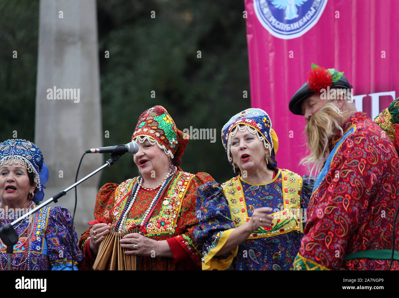 Traditional singing at an open air concert in Oak Park in Bishkek Stock Photo