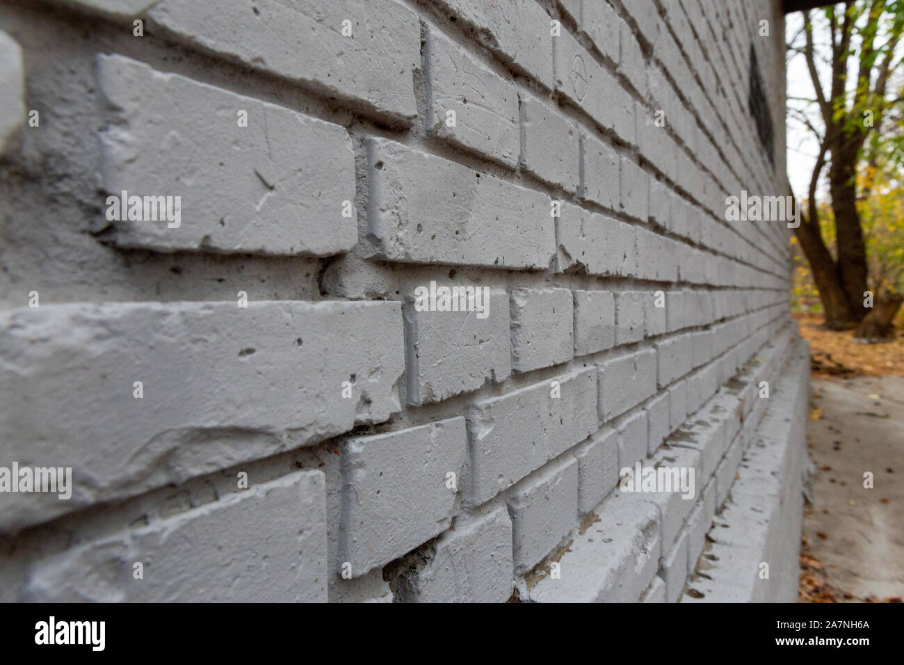 Gray brick wall. Photo background texture, close-up perspective view Stock Photo