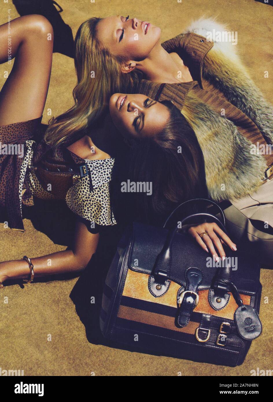 poster advertising GUCCI fashion house with Joan Smalls, Raquel Zimmerman in paper magazine from 2010 year, advertisement, creative GUCCI 2010s advert Stock Photo