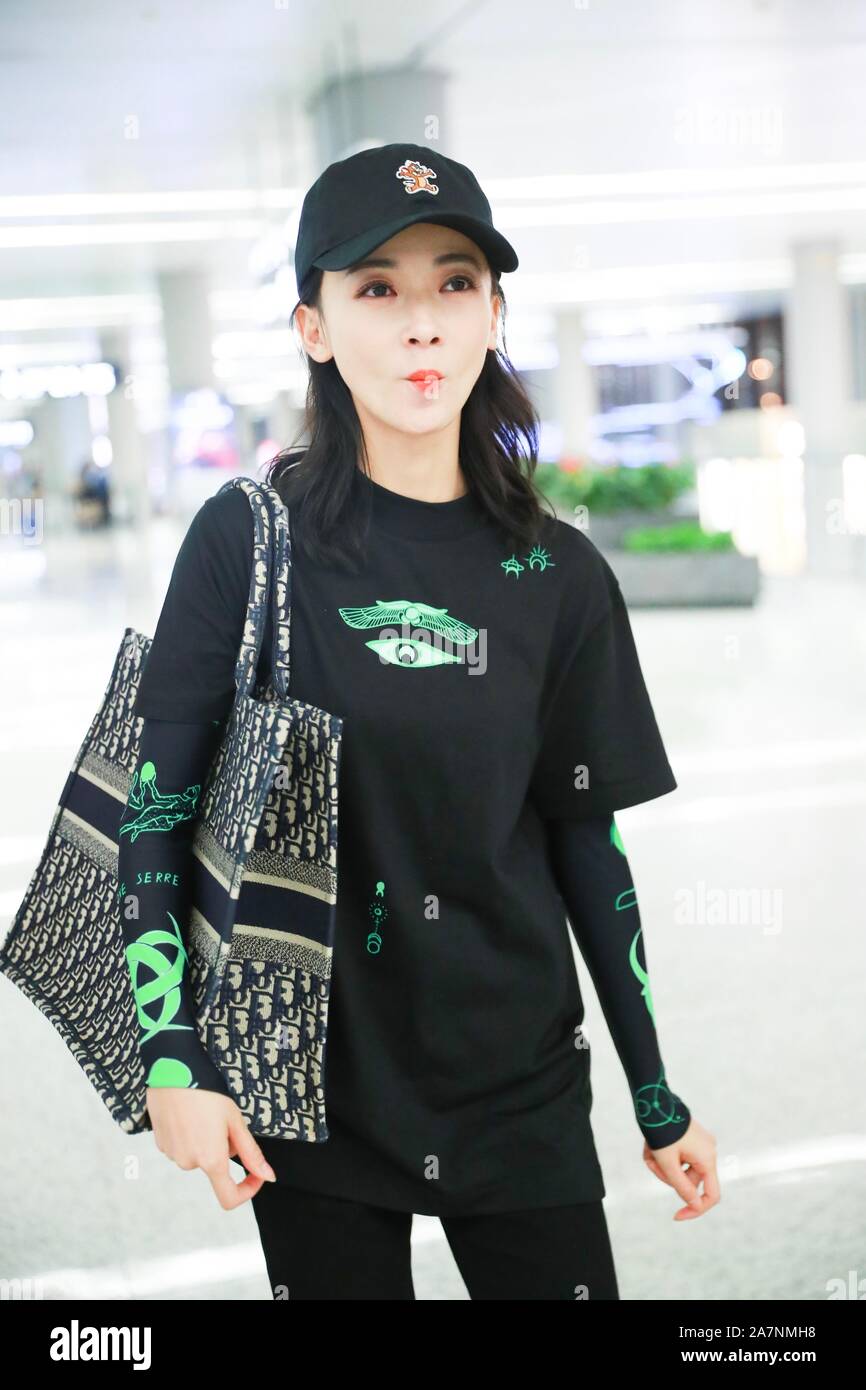 Chinese actress Wu Jiyan appears at an airport in Shanghai, China, 29  August 2019. Undershirt: Marine Serre Shorts: Rta Boots: Timberland Bag:  Dior ** Stock Photo - Alamy