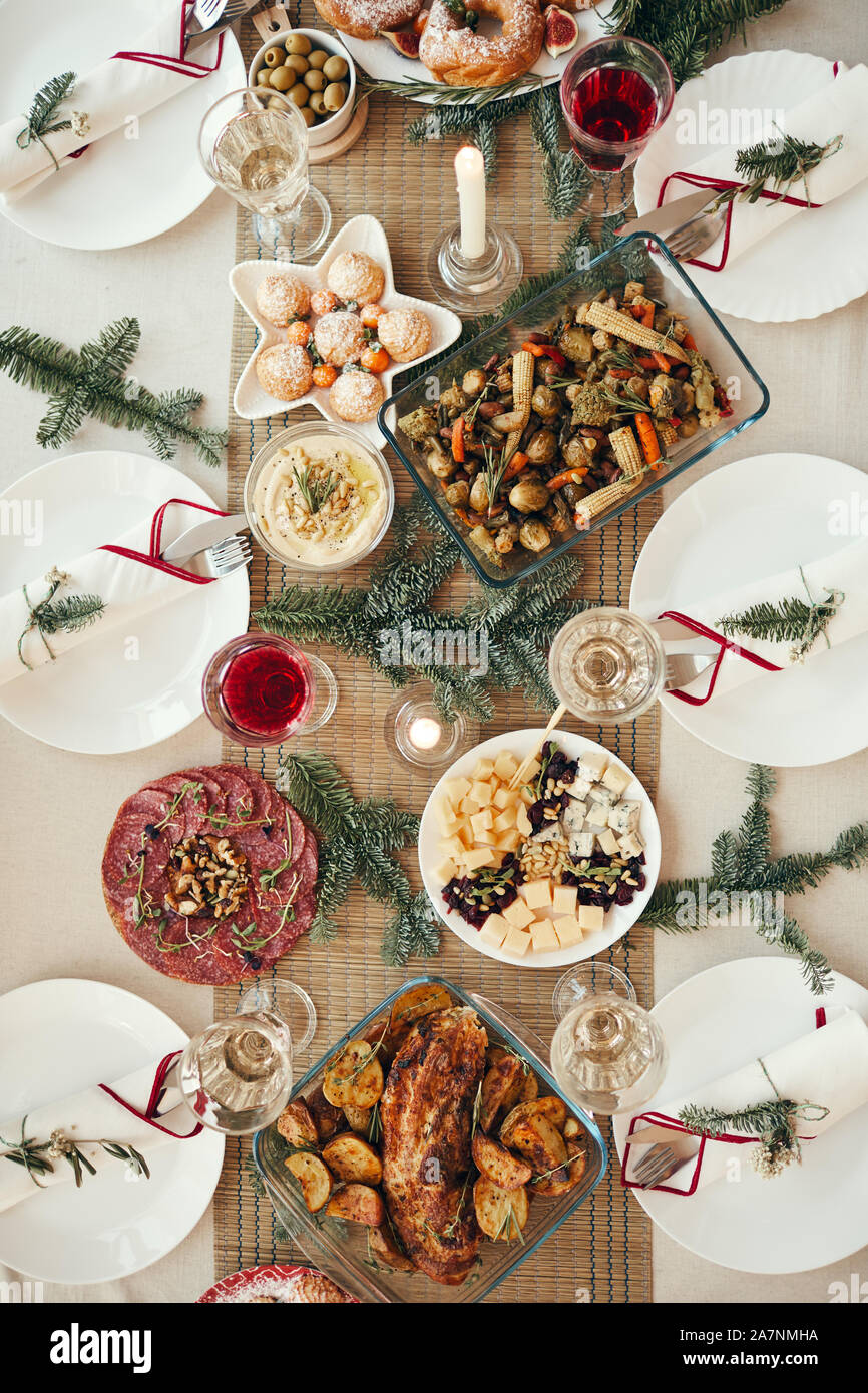 Top view background of beautiful dinner table decorated with fir