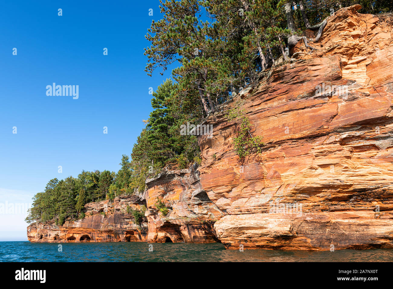 Sea caves, near Cornucopia, Autumn, Lake Superior, WI, USA, by Dominique Braud/Dembinsky Photo Assoc Stock Photo