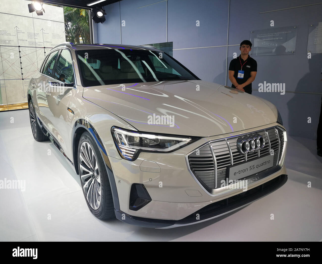 An Audi e tron 55 quattro car is displayed during an automobile