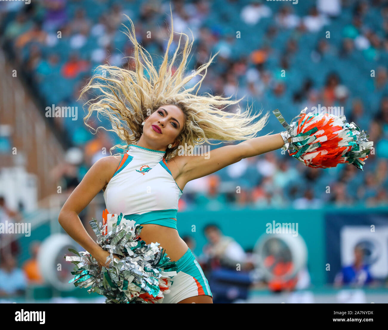 Miami Dolphins cheerleader performs during pre game wearing a