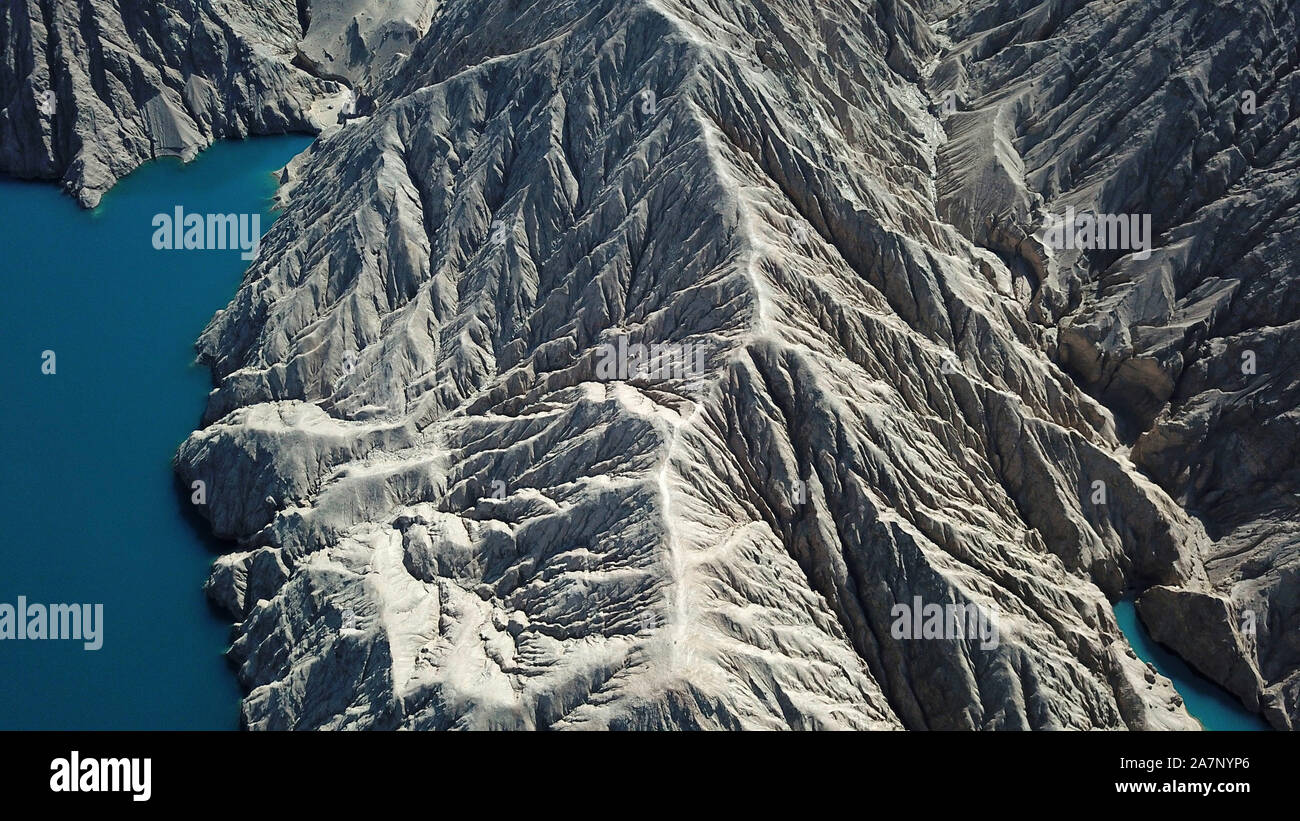 An aerial view of Milan River Reservoir, which was constructed in 2011 and is capable of generating over 10 million kWh annually, resembling a mountai Stock Photo