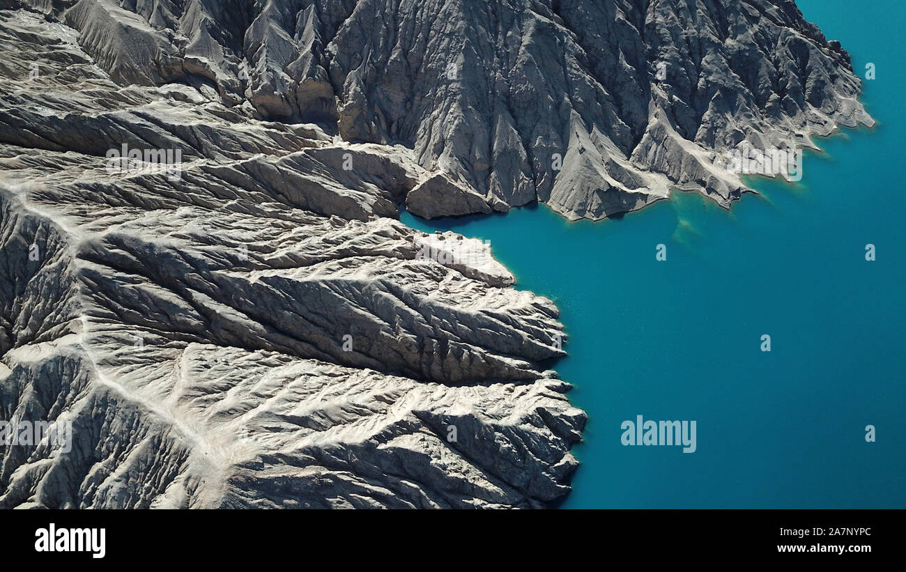 An aerial view of Milan River Reservoir, which was constructed in 2011 and is capable of generating over 10 million kWh annually, resembling a mountai Stock Photo