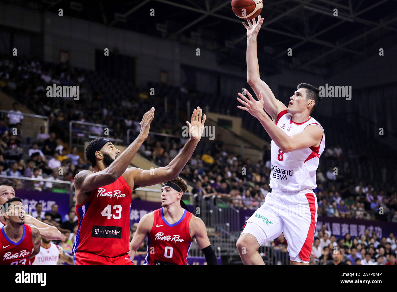 Cedi Osman, Turkish professional basketball player for the Cleveland  Cavaliers of the National Basketball Association (NBA), right, jumps to  score at Stock Photo - Alamy