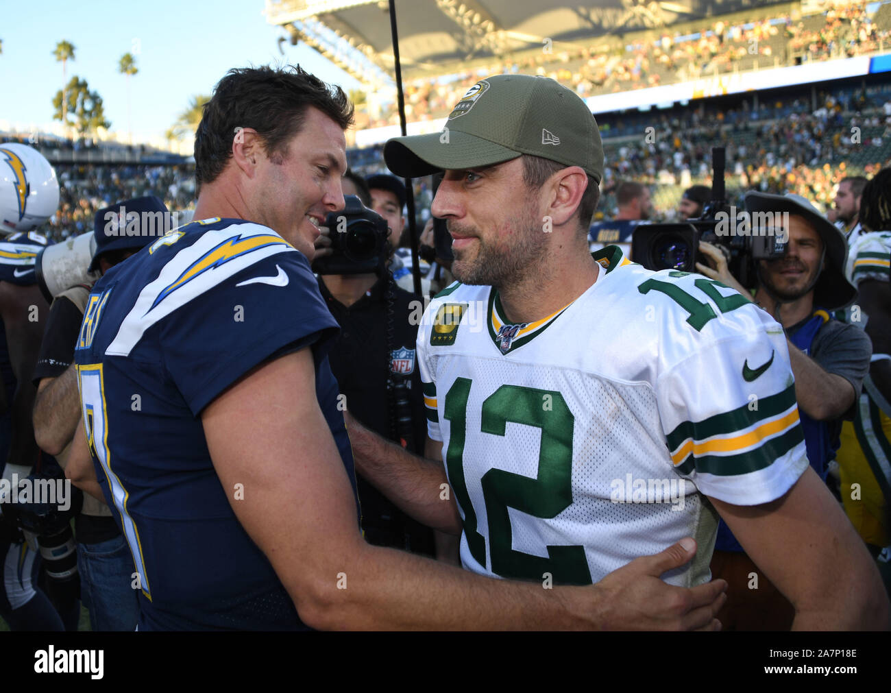 Carson, United States. 03rd Nov, 2019. Los Angeles Chargers' quarterback Philip Rivers and Green Bay Packers quarterback Aaron Rodgers embrace postgame at Dignity Health Sports Park in Carson, California on November 3, 2019. The Chargers beat the Packers 26-11. Photo by Jon SooHoo/UPI Credit: UPI/Alamy Live News Stock Photo