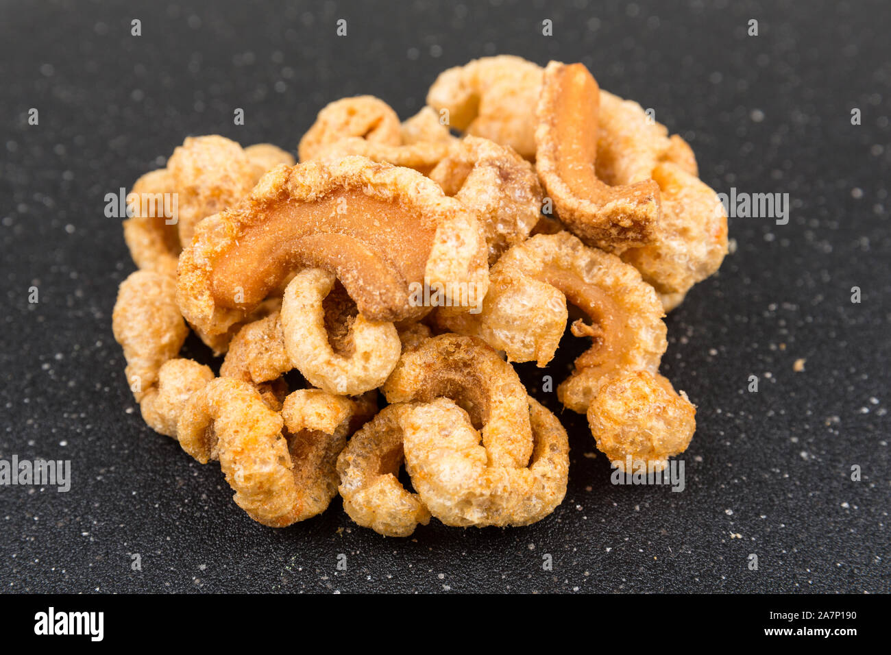 Low carb pork rind cracklins crunchy salty snack Stock Photo Alamy