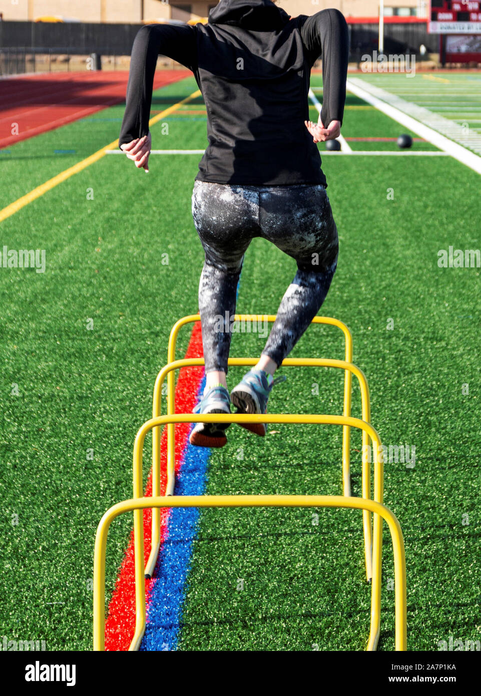 Athlete jumping over hurdle hires stock photography and images Alamy