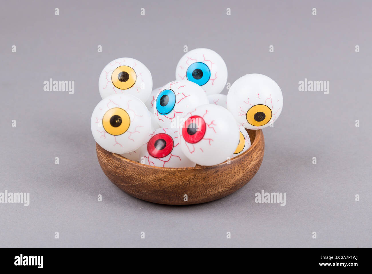 Spooky plastic multicolored eye  pieces in a bowl Stock Photo