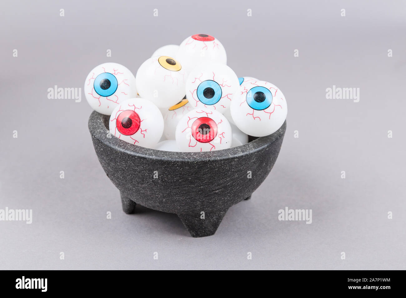 Spooky plastic multicolored eye  pieces in a bowl Stock Photo