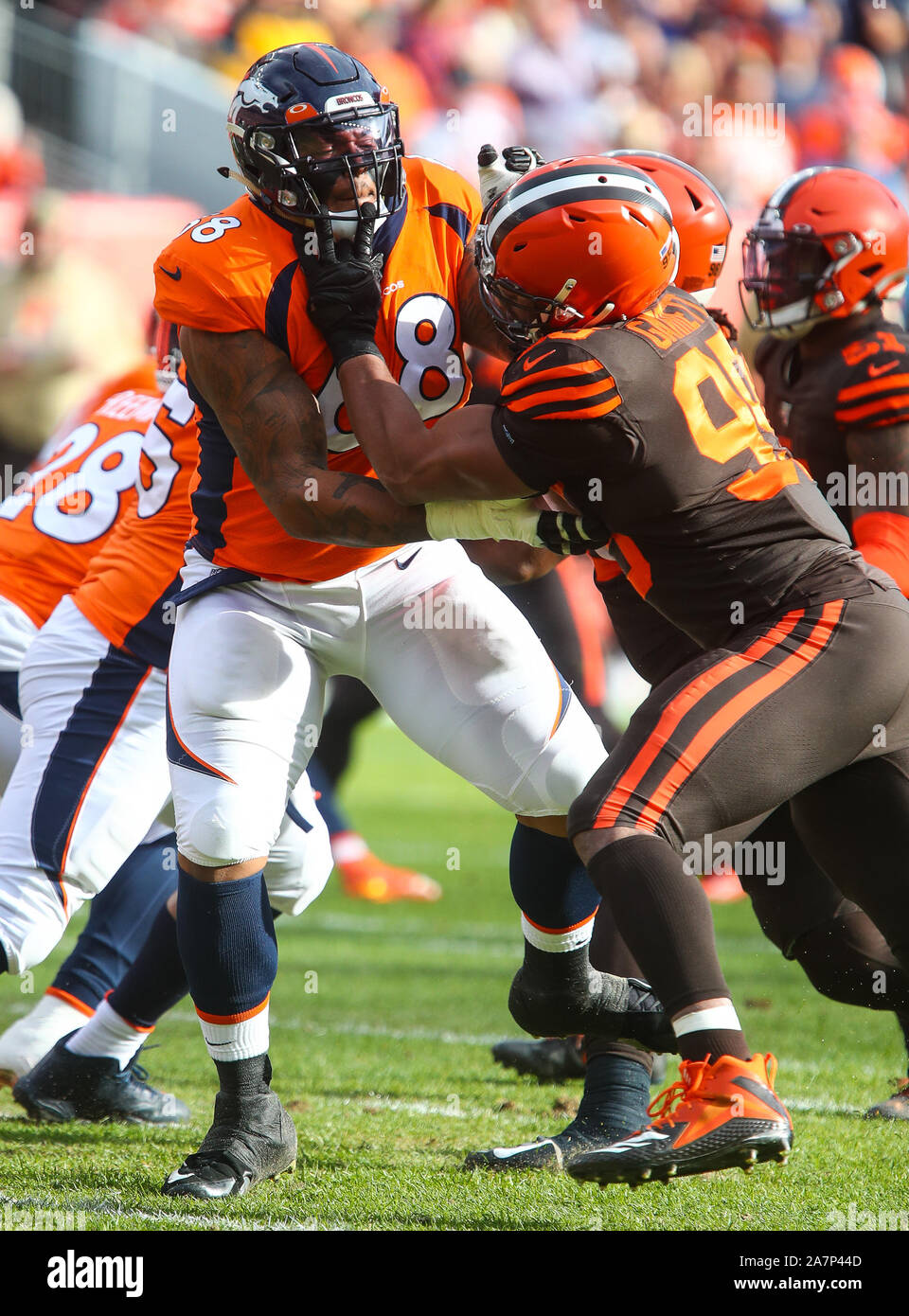 Cleveland Browns defensive end Myles Garrett (95) is punched by Pittsburgh  Steelers center Maur …