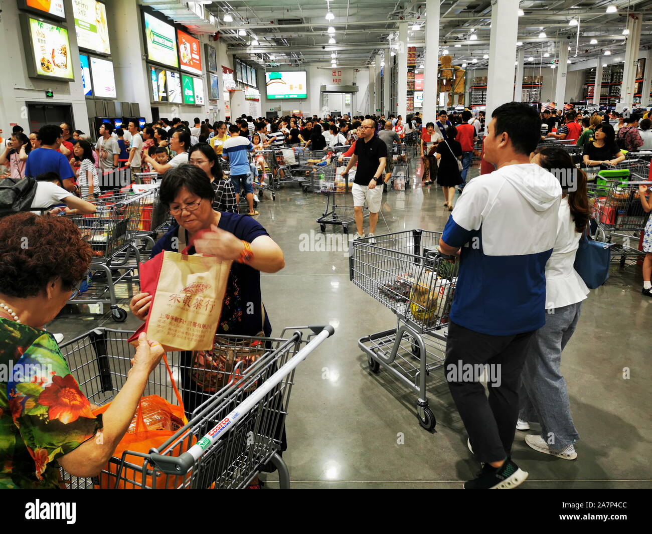 Chinese customers shop at the Costco store in Shanghai, China, 28