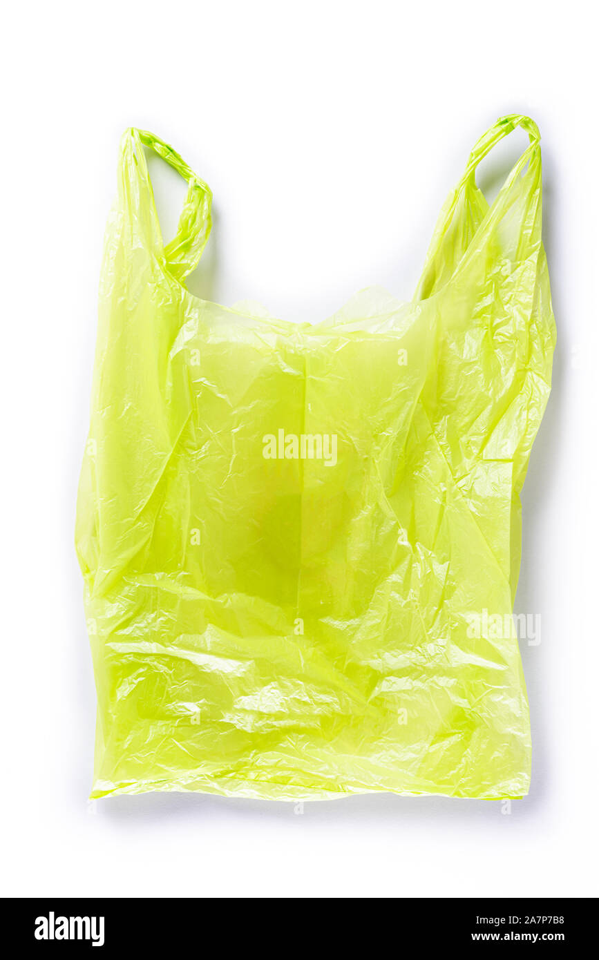 Top view of Green plastic bag on white background. Reduction of plastic ...