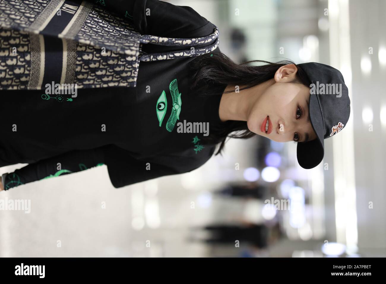 Chinese actress Wu Jiyan appears at an airport in Shanghai, China, 29  August 2019. Undershirt: Marine Serre Shorts: Rta Boots: Timberland Bag: Di  Stock Photo - Alamy