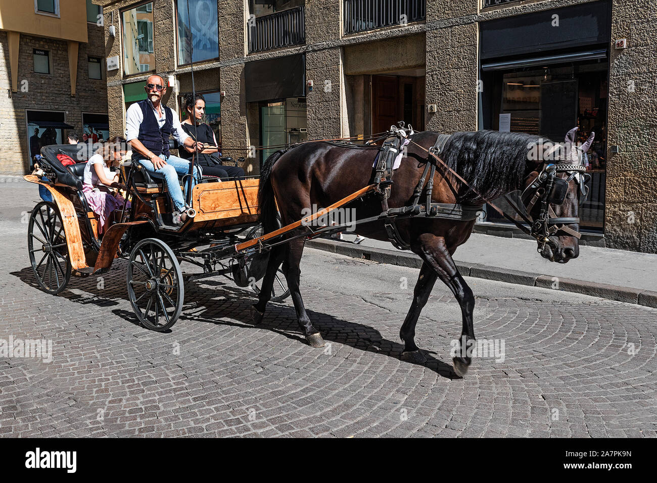 horse drawn carriage ride in the tuscan city of florence, italy. Stock Photo