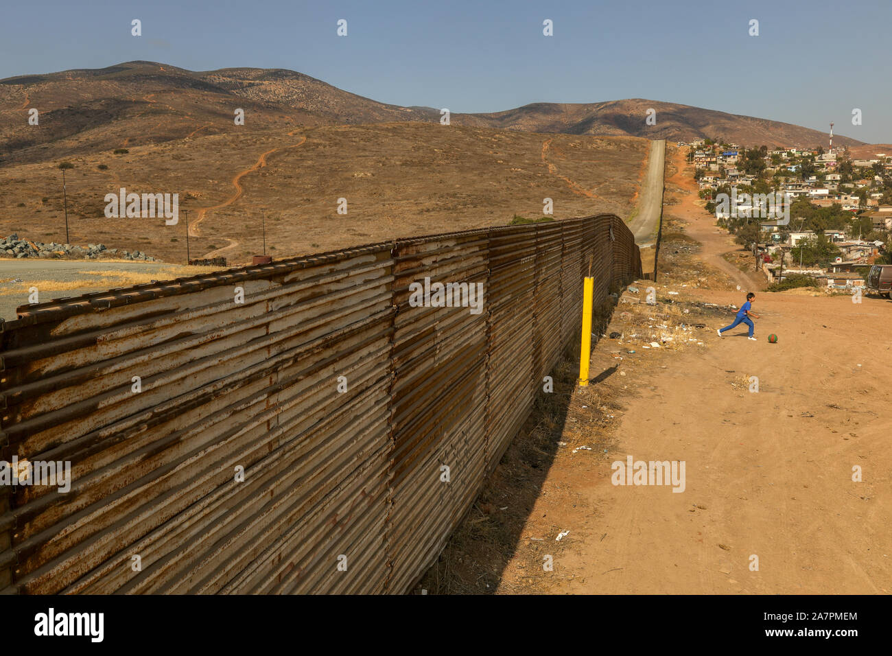Original US Mexico border fence with prototypes of the proposed new Trump wall erected just