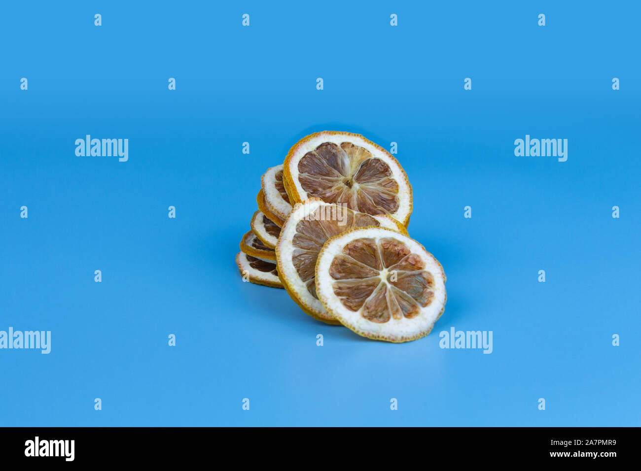 Dried lemon, dry lemon slice isolated Stock Photo - Alamy