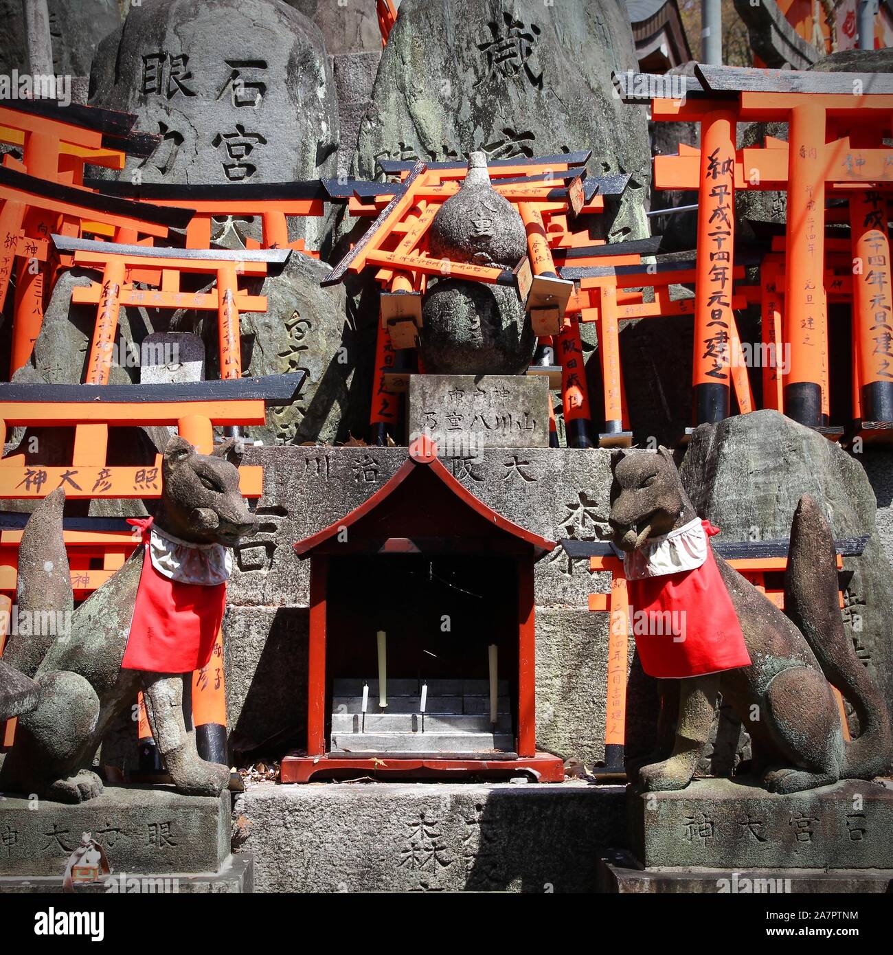 Japan landmark Fushimi Inari Taisha shrine in Kyoto prefecture. Famous shinto shrine. Statues