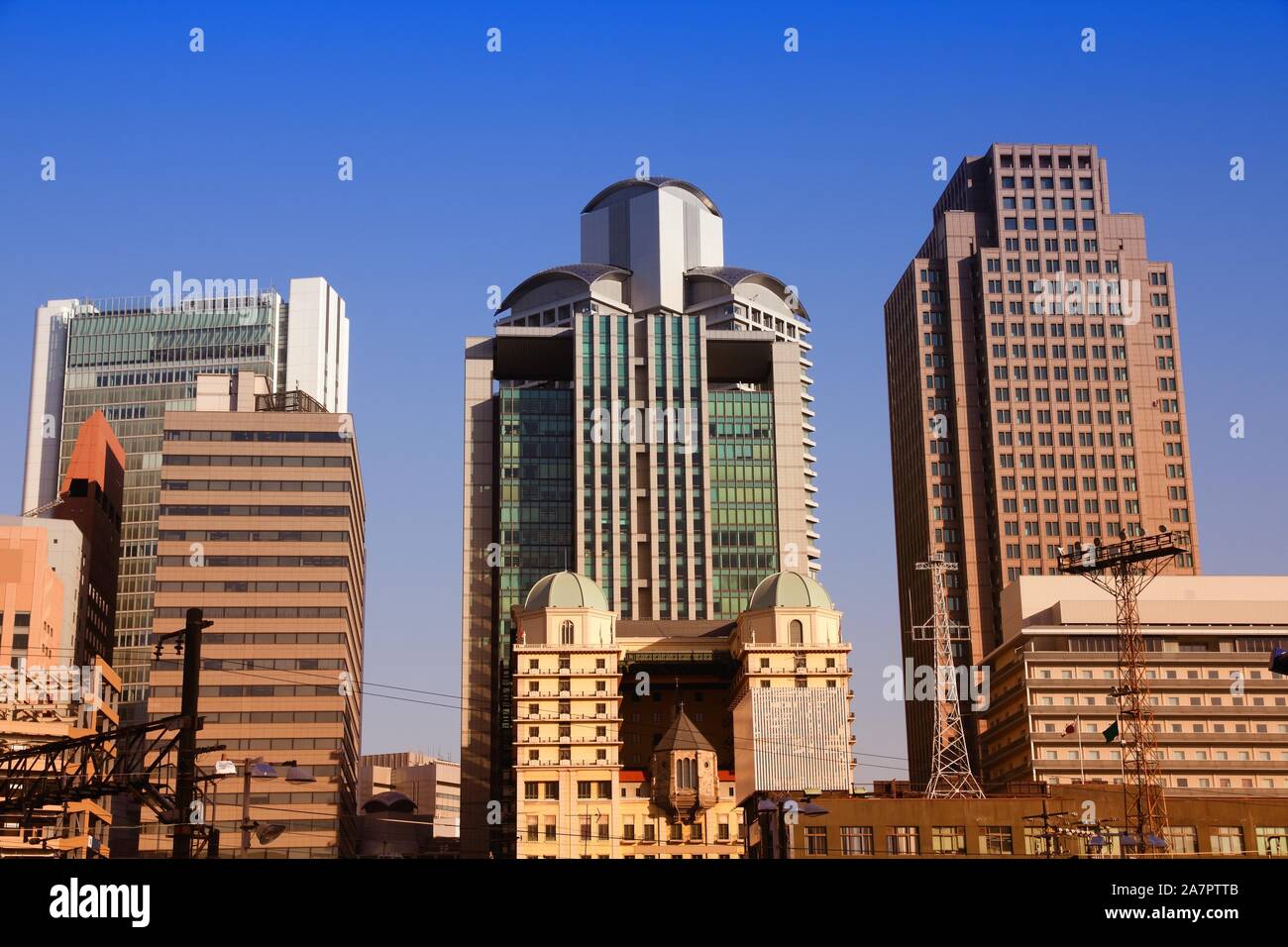 Osaka, Japan - skyline of famous city in the region Kansai. Modern ...