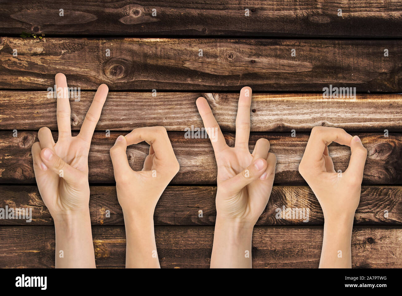 2020 written with hands and fingers signs, new year greeting card Stock Photo