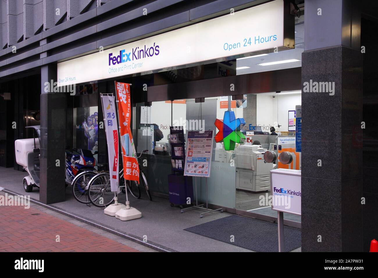 TOKYO, JAPAN - APRIL 13, 2012: Fedex Kinko's office and print center in Tokyo. Fedex Corporation exists since 1971 and employs 300,000 people as of 20 Stock Photo