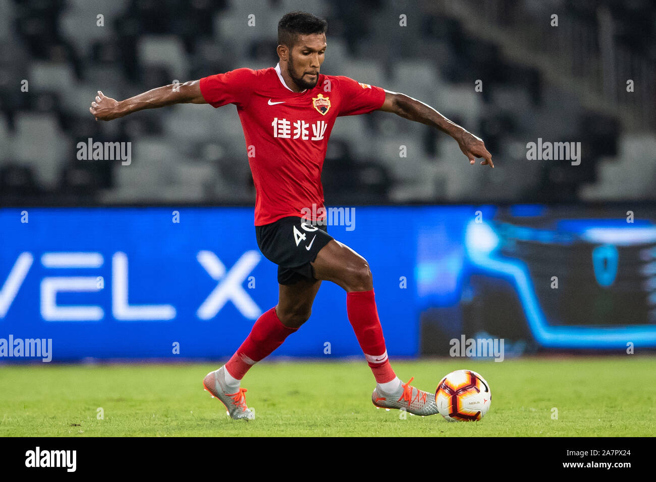 Brazilian-born Portuguese football player Dyego Sousa of Shenzhen F.C., chases after the ball in the 22nd round match during the 2019 Chinese Football Stock Photo