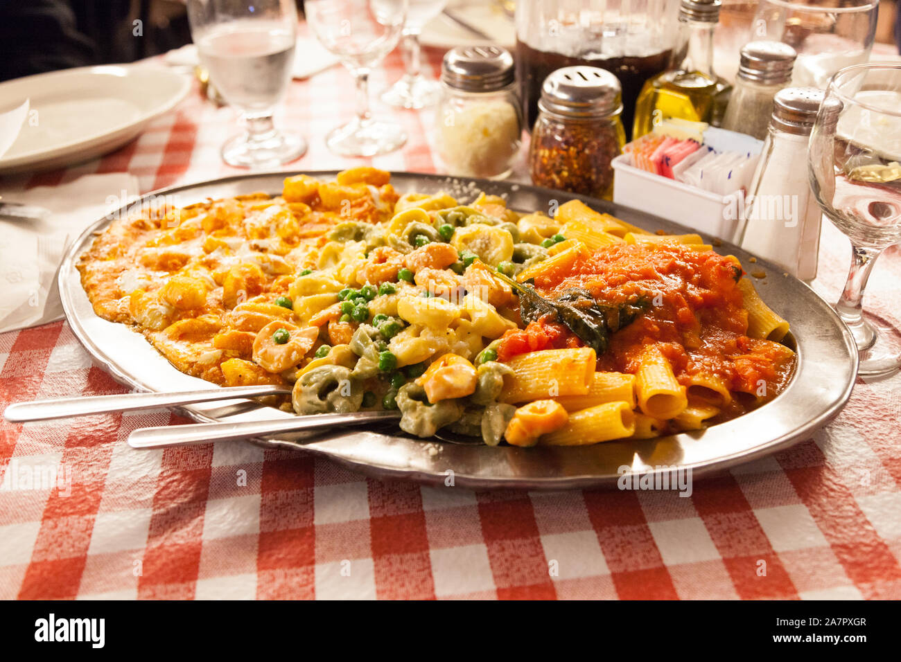 Platter of pasta at La Mela Italian restaurant, Little Italy, New York