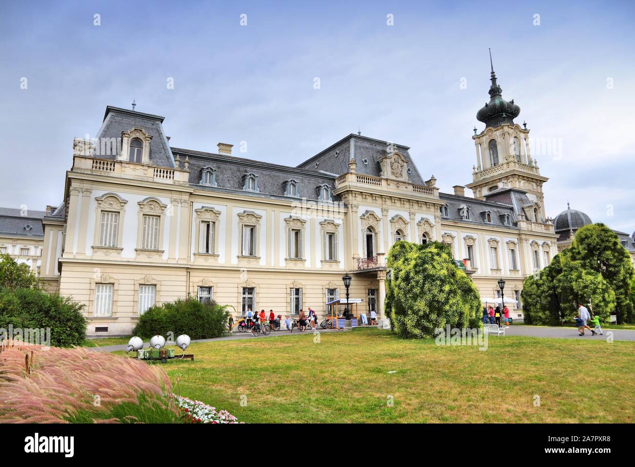 KESZTHELY, HUNGARY - AUGUST 11, 2012: Tourists visit Festetics Palace in Keszthely, Hungary. In 2011 tourism receipts in Hungary brought 4.03 billion Stock Photo