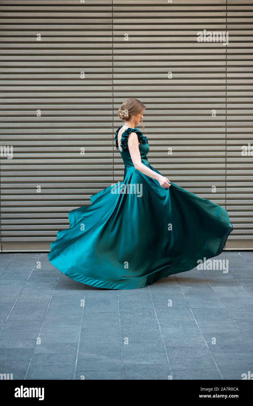Woman dancing with long dress hi-res stock photography and images - Alamy