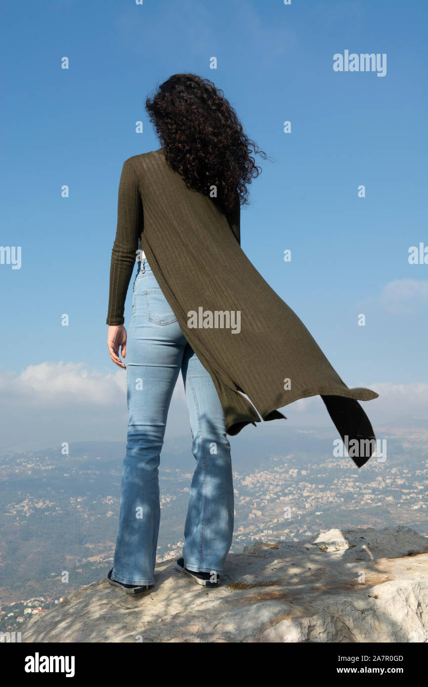 Young woman rear view alone hi-res stock photography and images - Alamy