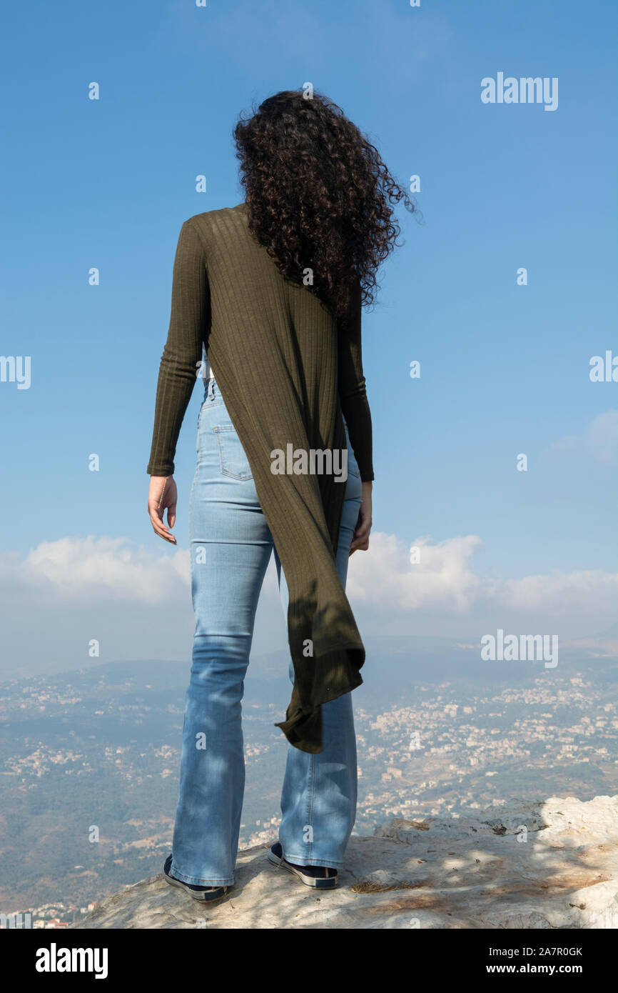 Young woman rear view alone hi-res stock photography and images - Alamy