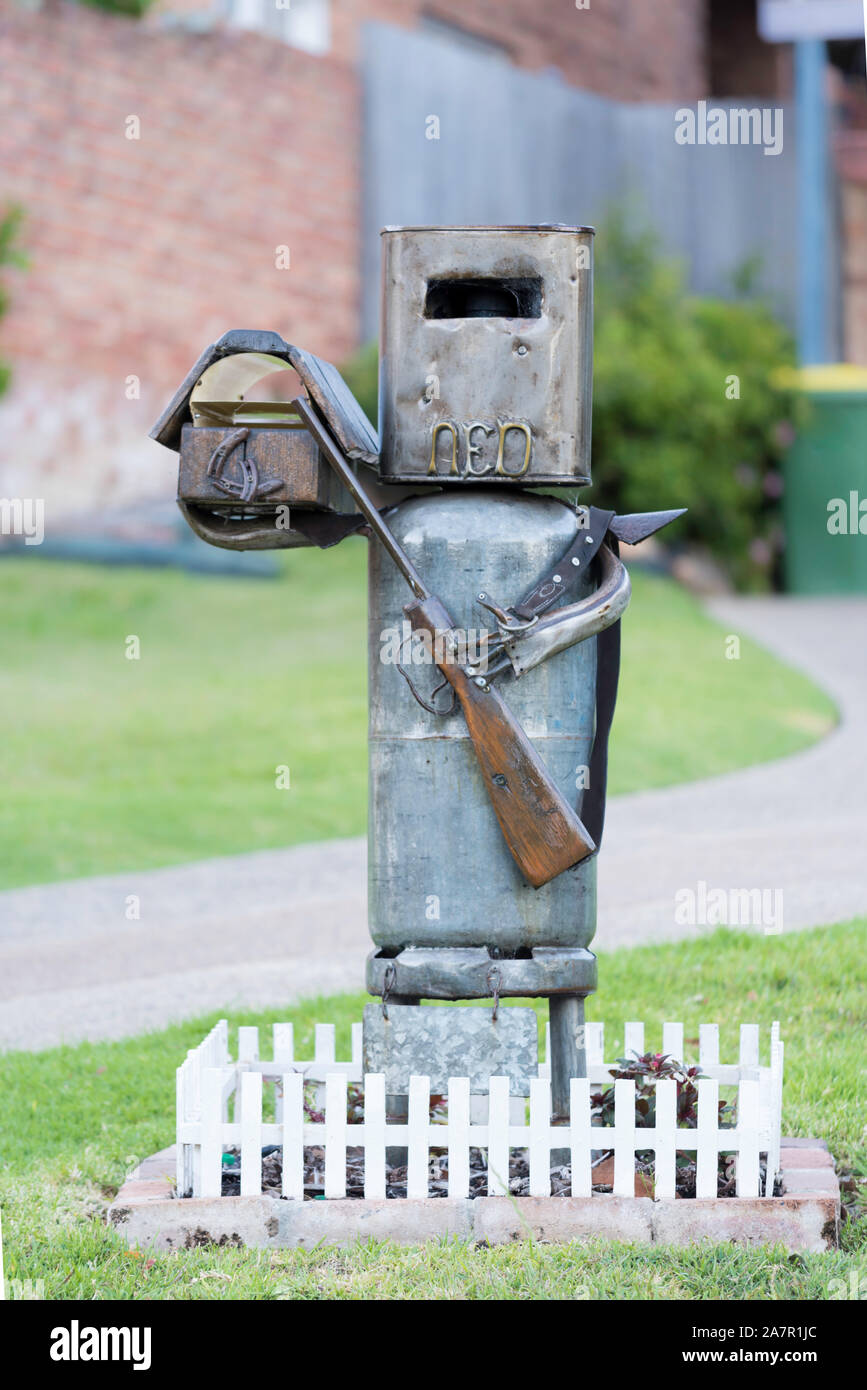 A letterbox made from an old gas bottle built to look like the famous Bushranger Ned Kelly (1854-1880) in his self fashioned armor Stock Photo