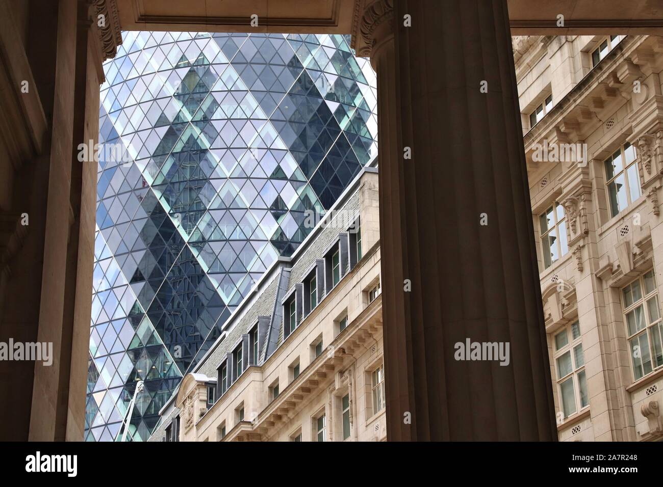 LONDON, UK - JULY 13, 2019: 30 St Mary Axe building in London. It was built in 2003 by Skanska and is owned by Safra Group. Stock Photo