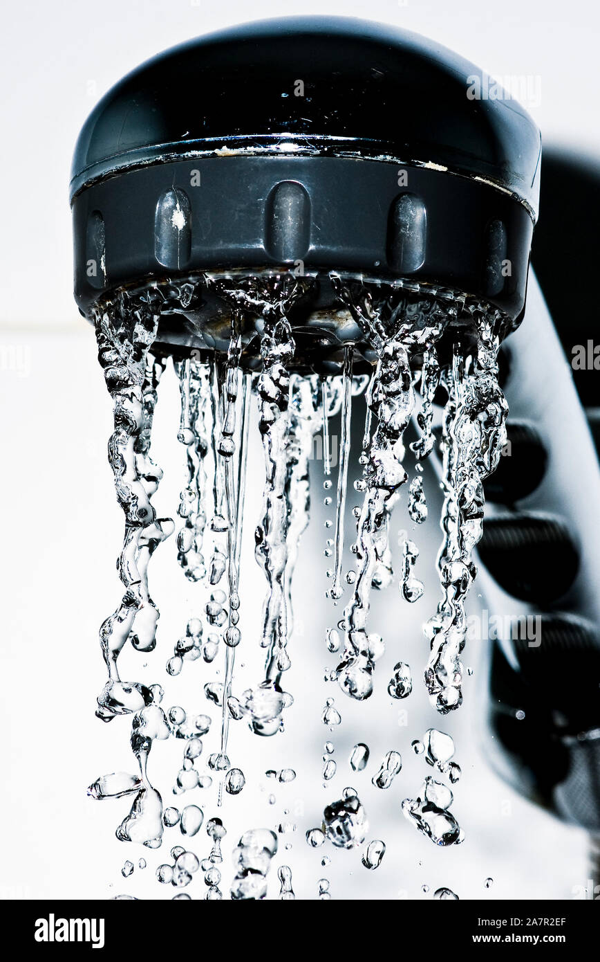 open shower tap with water Stock Photo Alamy