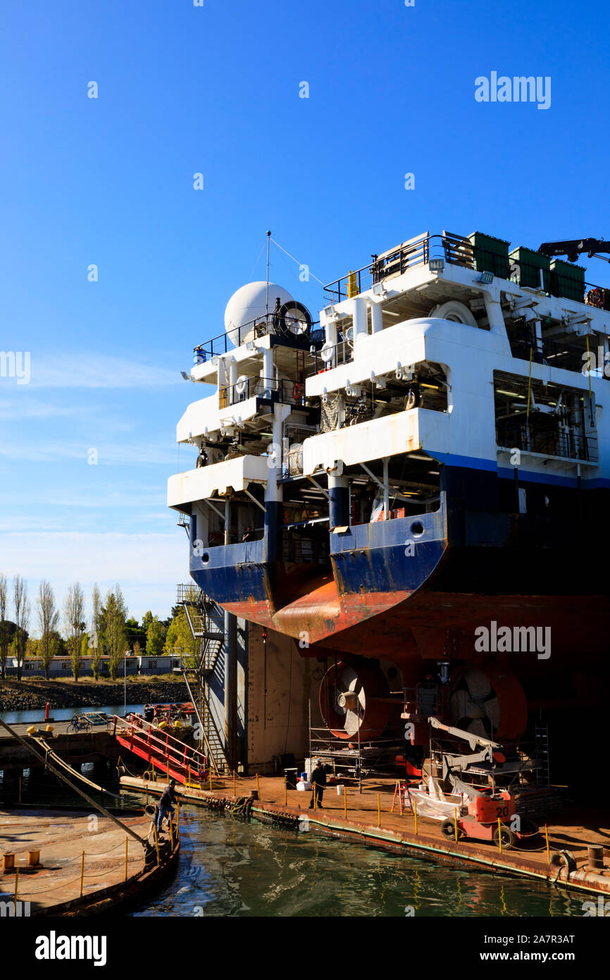 huge ship in dry dock for repair. Alameda, Oakland, California, United States of America Stock Photo